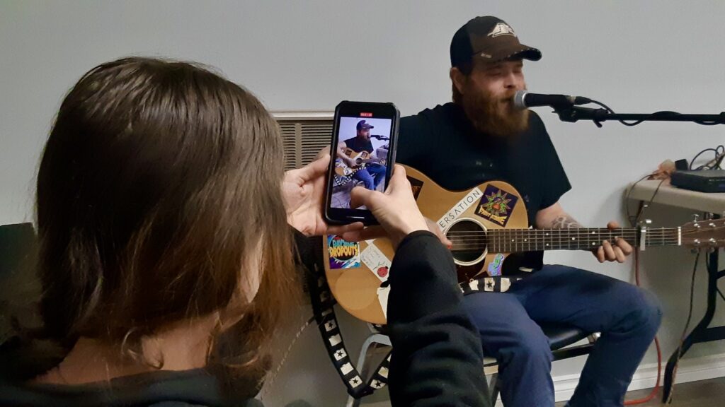Sean Merritt and Sara Fisher of The Birdfolk Buskers deliver a high-energy set to a packed house at Dyment Recreation Hall during the Family Day festivities.