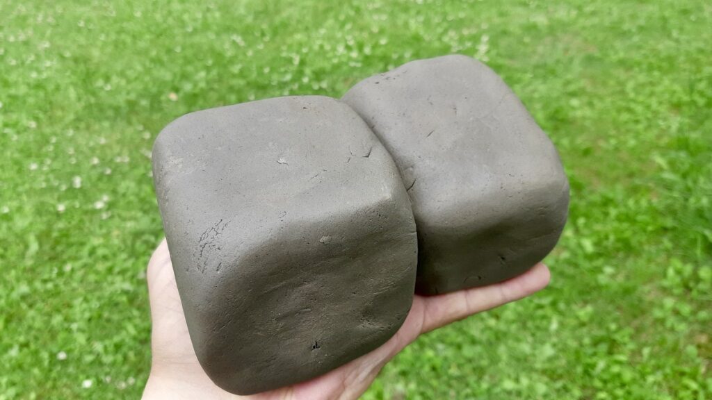 After a day of drying, enough our clay is ready for wedging. We shaped these into some cubes for building to see how well it performs.