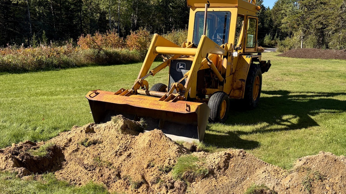Unearthing progress—every bucketful of earth moved brings the park one step closer to a fully functional, well-watered gathering and community garden space.