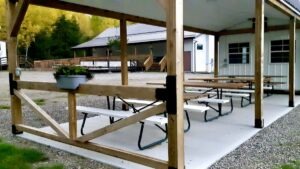 The outdoor grounds are transitioning smoothly into autumn, paving the way for upcoming concrete work and community garden infrastructure.