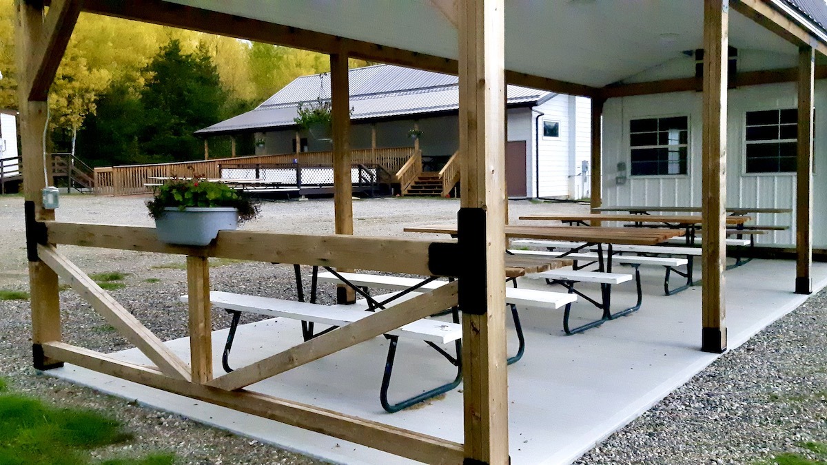 The outdoor grounds are transitioning smoothly into autumn, paving the way for upcoming concrete work and community garden infrastructure.